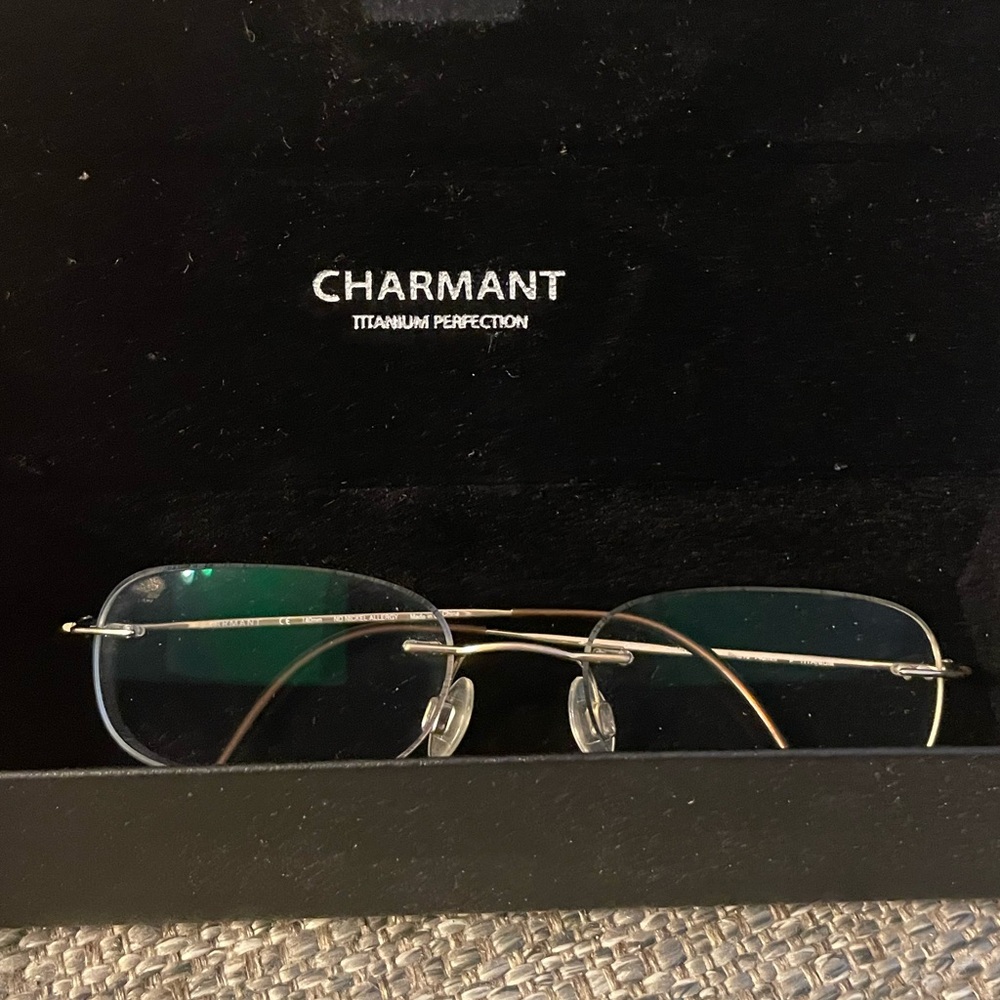 Charmant Eyeglasses Ch8600e Titanium Rimless Chassis Optical Frame